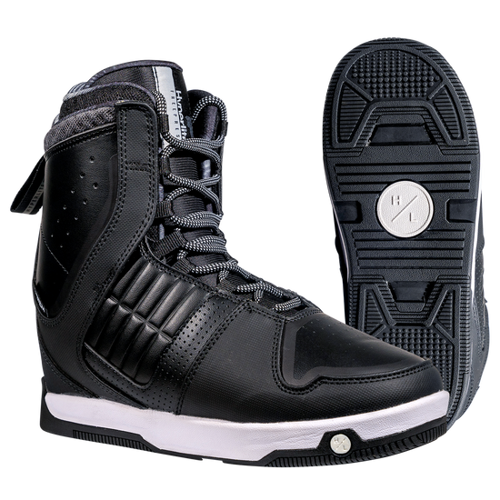 Freepress Boot: Black high-top with ankle harness, perforated details, and white sole.